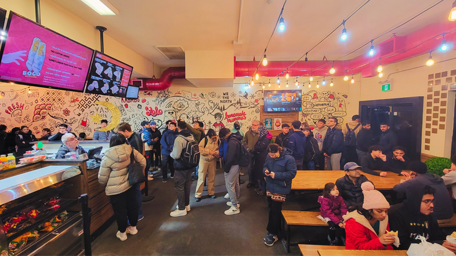 Busy dinner service inside the Shawerma Plus Waterloo restaurant